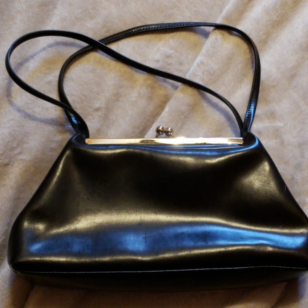 Black snap handbag